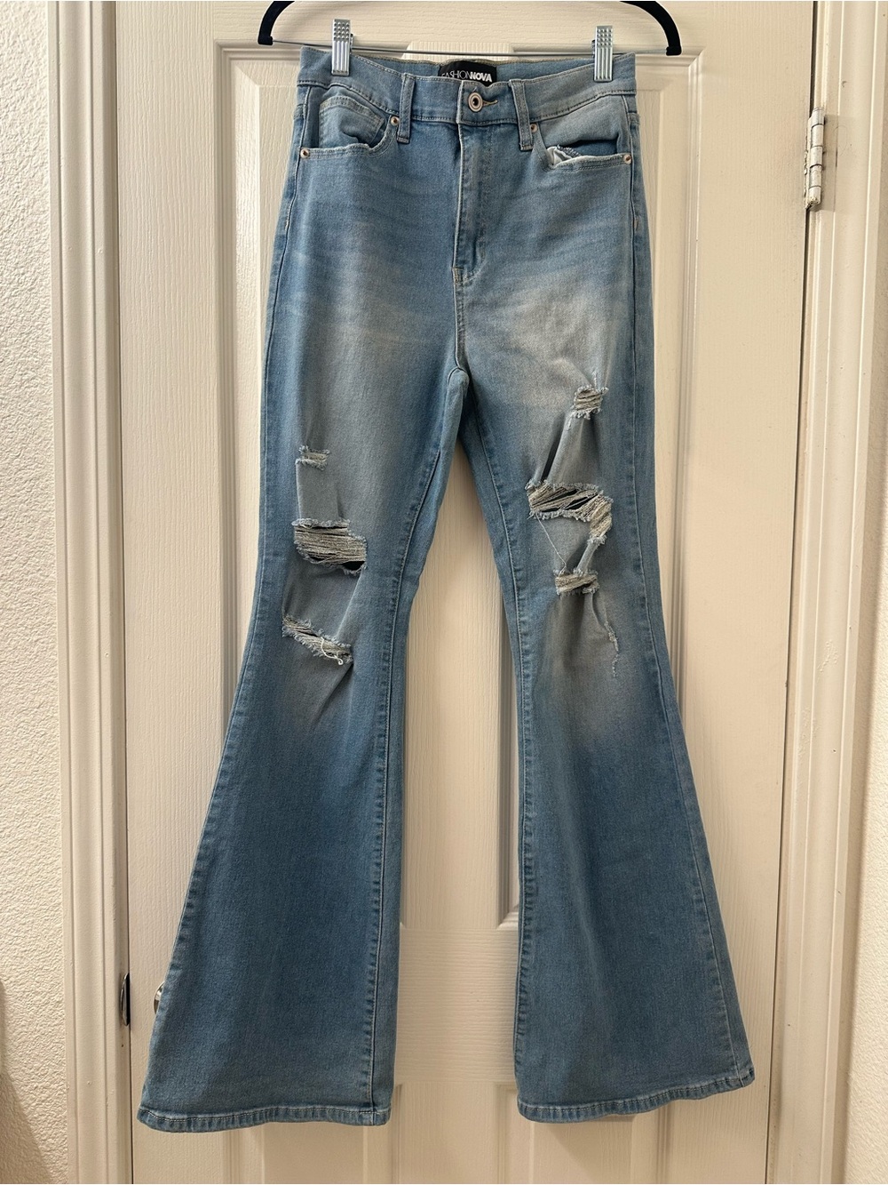 Fashion Nova Light Blue Distressed Flare Jeans